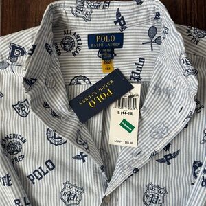 Boys Polo by Ralph Lauren White and Blue Patterned Shirt
•
Boys L (14/16)
